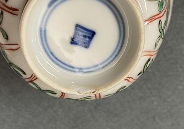 Eleven Chinese famille verte cups and saucers, Kangxi