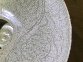 A Chinese Yaozhou celadon bowl with incised floral design, Song or later