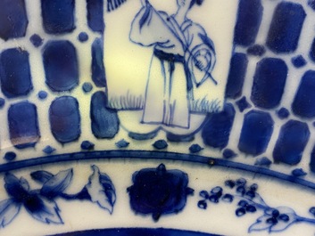 A Chinese blue and white dish after Cornelis Pronk: 'Dames au Parasol', Qianlong