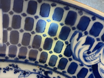 A Chinese blue and white dish after Cornelis Pronk: 'Dames au Parasol', Qianlong