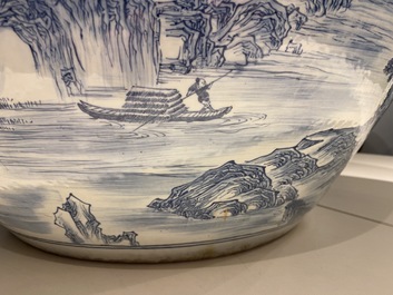 A large Chinese blue and white 'landscape' fish bowl, Qianlong