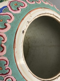 A pair of Chinese famille rose ginger jars with phoenixes, 19th C.