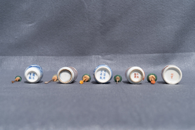 Five Chinese blue and white, iron- and copper-red snuff bottles, 19th C.