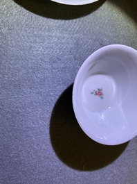 Five Chinese famille rose cups and saucers, Yongzheng/Qianlong