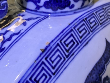 A fine Chinese blue and white 'Bajixiang' moon flask vase, Qianlong mark, 19th C.