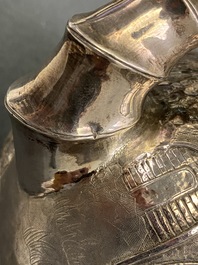 A Chinese silver teapot, cream jug and sugar jar, marked Luen Wo - Shanghai, late 19th C.