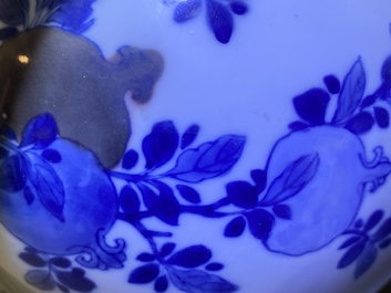 A Chinese blue, white and copper-red 'peaches' bottle vase with inscription, Kangxi