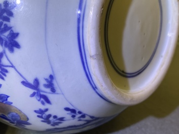 A Chinese blue, white and copper-red 'peaches' bottle vase with inscription, Kangxi