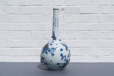 A Chinese blue, white and copper-red 'peaches' bottle vase with inscription, Kangxi