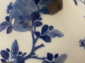 A Chinese blue, white and copper-red 'peaches' bottle vase with inscription, Kangxi