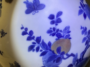 A Chinese blue, white and copper-red 'peaches' bottle vase with inscription, Kangxi