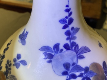 A Chinese blue, white and copper-red 'peaches' bottle vase with inscription, Kangxi