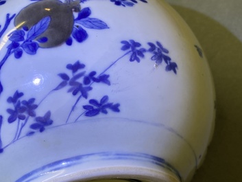 A Chinese blue, white and copper-red 'peaches' bottle vase with inscription, Kangxi