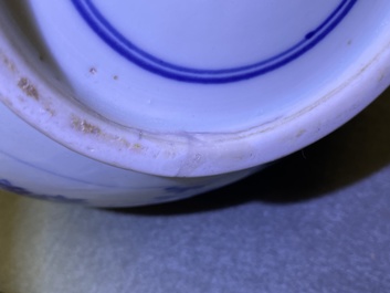 A Chinese blue, white and copper-red 'peaches' bottle vase with inscription, Kangxi