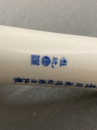 A Chinese blue, white and copper-red 'peaches' bottle vase with inscription, Kangxi
