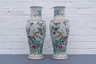A pair of Chinese famille rose and a pair of blue and white vases, 19th C.