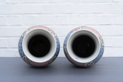 A pair of Chinese famille rose and a pair of blue and white vases, 19th C.