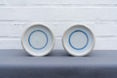 A pair of Chinese famille rose and a pair of blue and white vases, 19th C.