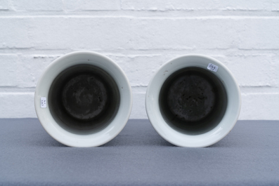 A pair of Chinese famille rose and a pair of blue and white vases, 19th C.