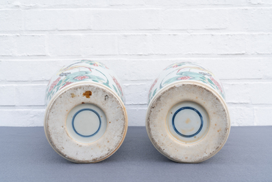 A pair of Chinese famille rose and a pair of blue and white vases, 19th C.