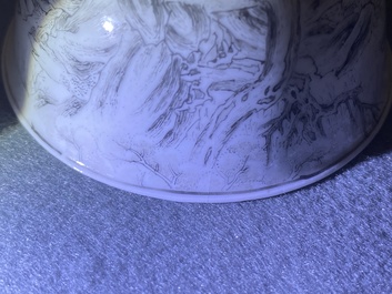 Une tasse et soucoupe en porcelaine de Chine grisaille &agrave; d&eacute;cor d'Europ&eacute;ens, Yongzheng