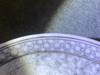 Une tasse et soucoupe en porcelaine de Chine grisaille &agrave; d&eacute;cor d'Europ&eacute;ens, Yongzheng