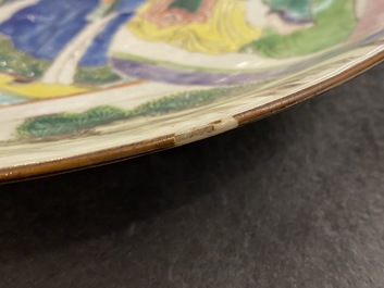 A Chinese famille rose dish with a dancer at court, Yongzheng