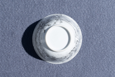 Une tasse et soucoupe en porcelaine de Chine grisaille &agrave; d&eacute;cor d'Europ&eacute;ens, Yongzheng
