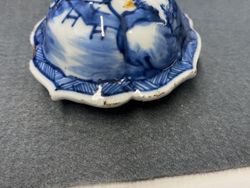 A Chinese blue and white five-piece 'landscape' garniture, Kangxi
