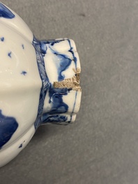 A Chinese blue and white five-piece 'landscape' garniture, Kangxi