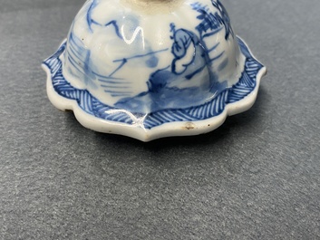 A Chinese blue and white five-piece 'landscape' garniture, Kangxi