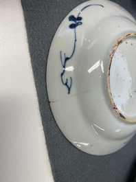 Eight Chinese blue and white cups and saucers, Kangxi