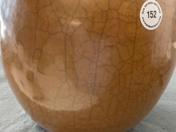 A Chinese monochrome brown-glazed jar, 19th C.