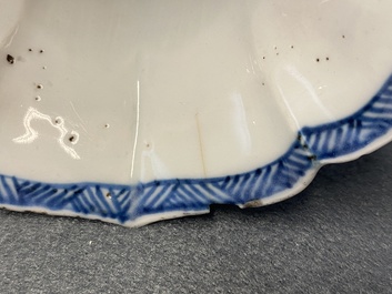 A Chinese blue and white five-piece 'landscape' garniture, Kangxi
