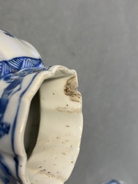 A Chinese blue and white five-piece 'landscape' garniture, Kangxi