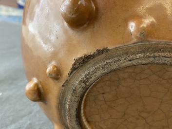 A Chinese monochrome brown-glazed jar, 19th C.