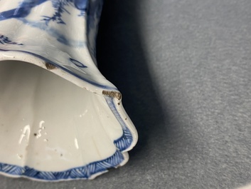 A Chinese blue and white five-piece 'landscape' garniture, Kangxi