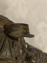 A Chinese bronze figure of a dignitary, Ming