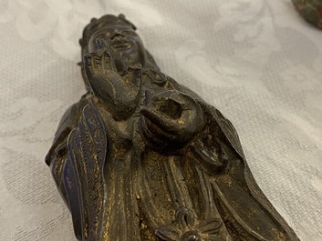 A Chinese bronze figure of a dignitary, Ming