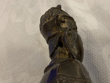 A Chinese bronze figure of a dignitary, Ming