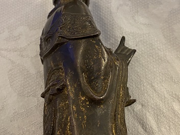 A Chinese bronze figure of a dignitary, Ming