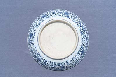 A Chinese Ming-style blue and white 'floral scroll' dish, Qianlong