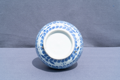 A Chinese blue and white bottle vase with figural medallions, Transitional period