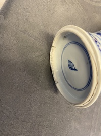 A Chinese blue and white five-piece garniture with floral design, Kangxi