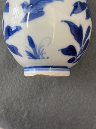 A pair of small Chinese blue and white candlesticks and three vases, Kangxi