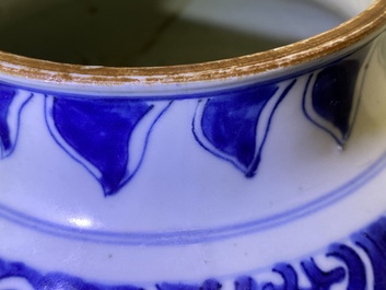 Een Chinese blauw-witte vaas met florale panelen, Kangxi