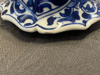 A Chinese blue and white five-piece garniture with floral design, Kangxi