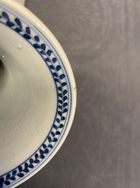 A Chinese blue and white five-piece garniture with floral design, Kangxi