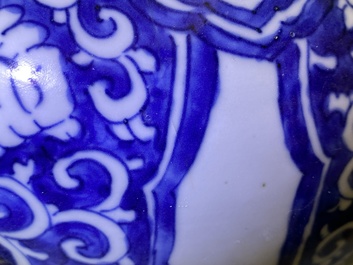 Een Chinese blauw-witte vaas met florale panelen, Kangxi