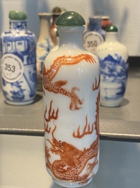 Five Chinese blue and white, iron- and copper-red snuff bottles, 19th C.